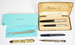 Boxed Tiffany silver propelling pencil, Parker 51 fountain pen and propelling pencil set etc