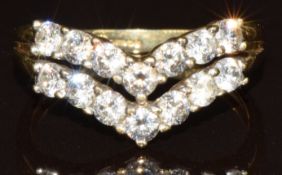 A 14k gold 'V' shaped ring set with cubic zirconia, 2.8g, size P