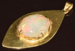 An 18k gold pendant set with an opal cabochon of approximately 15ct, 12.5g, 5.7 x 2.8cm