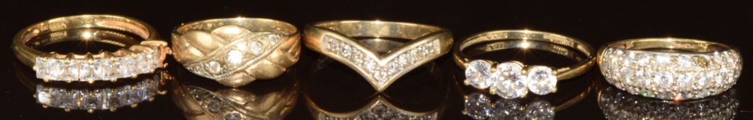 Five 9ct gold rings set with cubic zirconia, 11g, size L, P, N & O