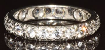 A White gold eternity ring set with synthetic spinel, 3.2g, size M