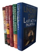 LINDSEY DAVIS, TWO SIGNED HARDBACK BOOKS Together with three other Lindsey Davis hardback books,