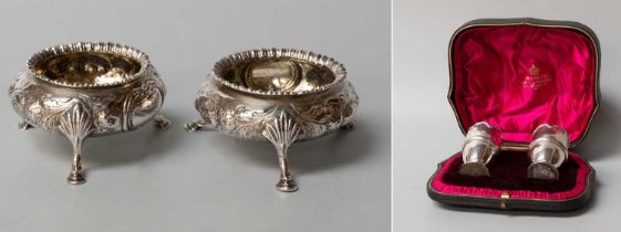 A Pair of Victorian Silver Salt-Cellars, London, 1858, in the George II style, bombe and on three