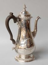 A George III Silver Coffee-Pot, Maker's Mark I*B, Possibly for James Baker or John Broughton,