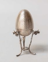 An Elizabeth II Silver Novelty Egg and Stand, by Peter Nicholas and Co. Ltd., London, 1987, the