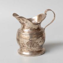 A Dutch Silver Cream-Jug, Maker's Mark Indistinct, Circa 1900, helmet-shaped and on spreading