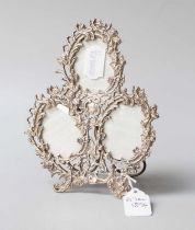 A Victorian Silver Triple Photograph-Frame, by Lawrence Emanuel, Birmingham, 1894, tapering and with