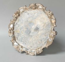 A Victorian Silver Salver, by Roberts and Hall, Sheffield, 1848, shaped circular and on three