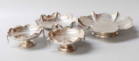 Four Assorted Silver Dishes, each shaped circular and on spreading foot, including one with