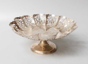 A George VI Silver Pedestal-Dish, by Viners Ltd., Sheffield, 1938, the shaped border pierced, on