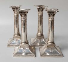 A Set of Four George V Silver Candlesticks, by Goldsmiths and Silversmiths Co. Ltd., London, 1911,