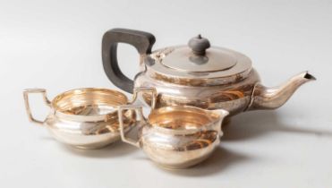 A Three-Piece George V Silver Tea-Service, by Charles Edwards, London, 1917, compressed circular and