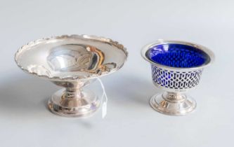 Two Differing Silver Bowls, each on spreading foot, the larger bowl with shaped rim, the other