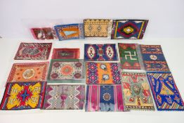 Twelve Indian Blanket series felts / blankets depicting native American design blankets,