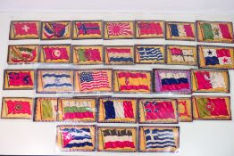 Cigarette felts / blankets, all flags, approximately 9 cm x 13.5 cm, thirty two in total.