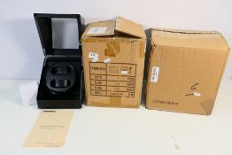 Two boxed automatic watch winders. [2].