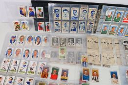 A binder of sporting related cards to include Ogden's, Churchman's, Will's and other,