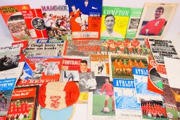 A mixed lot of football related items and ephemera to include a Hibernian FC Handbook Season