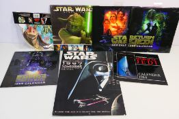 Star Wars calendars - To include: Two collector's oversized calendars: 1997 20th Anniversary & 1999