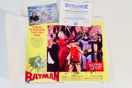 A copy of the 1966 Batman movie film poster signed by Adam West and Burt Ward,