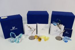 Swarovski - Three boxed butterfly ornaments,