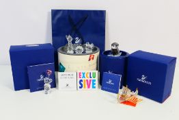 Swarovski - Boxed ornaments to include a Viking longboat and stand, Kris Bear with Pink Heart,