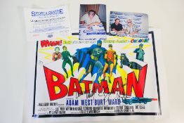 A copy of the 1966 Batman movie film poster signed by Adam West and Burt Ward,