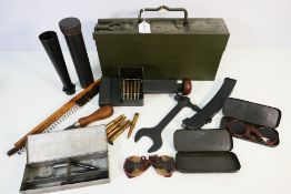 A WW 2 ammo box containing various military tools and objects to include an MG13 takedown wrench.