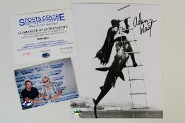 Batman - A signed photographic image depicting Batman being attacked by a shark,