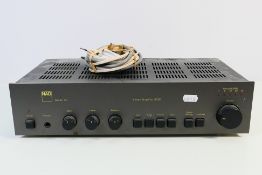 A NAD Series 20 Stereo Amplifier, model 3020.
