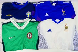 Football Shirts - A collection of national team shirts to include Sweden, France and Nigeria,