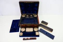 A good quality travelling vanity case with brass inlay,