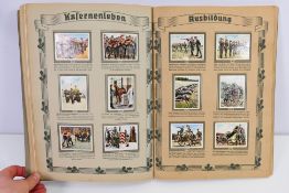 Die Deutsche Wehrmacht cigarette card album depicting army, navy and air force images,