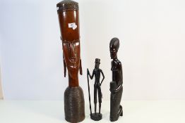 Ethnographica - Three carved hardwood tribal figures / bust, largest approximately 64 cm (h). [3].