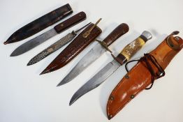 A small collection of knives to include a William Rodgers Green River knife marked I Cut My Way.