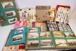 Lot to include postcards, stamps and oth