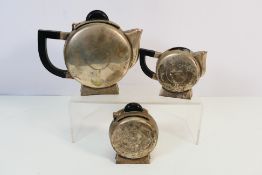 A silver plated Art Deco style three piece tea set, seemingly unmarked,