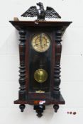 A Vienna style wall clock with pendulum, 81 cm.