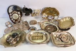 A collection of plated wares to include dishes, toast racks, trophy shield and similar.