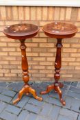 A pair of plant / jardiniere stands with inlaid decoration on tripod supports with turned columns,