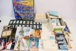 Lot to include postcards, cigarette / te