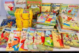 A good collection of Rupert The Bear annuals and other.