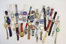 A quantity of vintage wristwatches to include Timex, Lorus, Swatch, Avia and other.