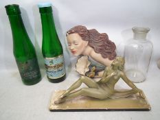 A collection of Glass Bottles, Statues,
