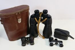 Binoculars and opera glasses to include a cased set of US Pattern 10 x 60.