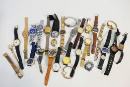 A collection of vintage wristwatches to include Lorus, Carvel, Sekonda, Swatch, Citizen and other.