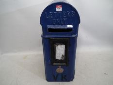 A novelty postbox repainted in blue (ove
