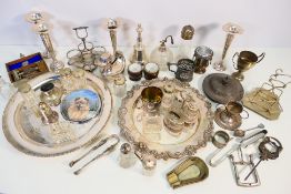 A quantity of plated wares to include vases, cruets, salver and other.