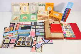 A collection of Beatrix Potter books, a