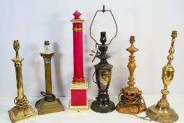 A collection of table lamps / lamp bases to include Royal Worcester,